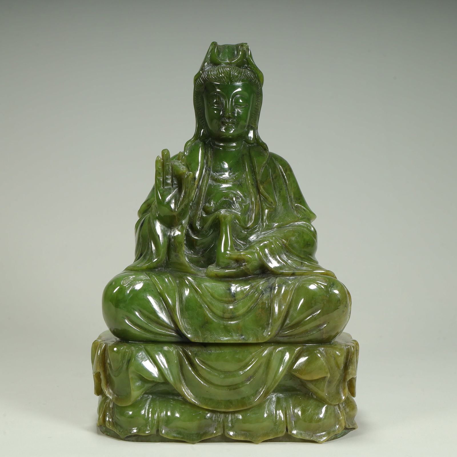 A seated statue of Guanyin in jasper (1 of 12)