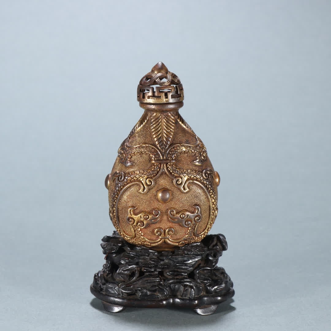 A piece of Qing Dynasty copper gilt two dragon play pearl snuff bottles (1 of 9)