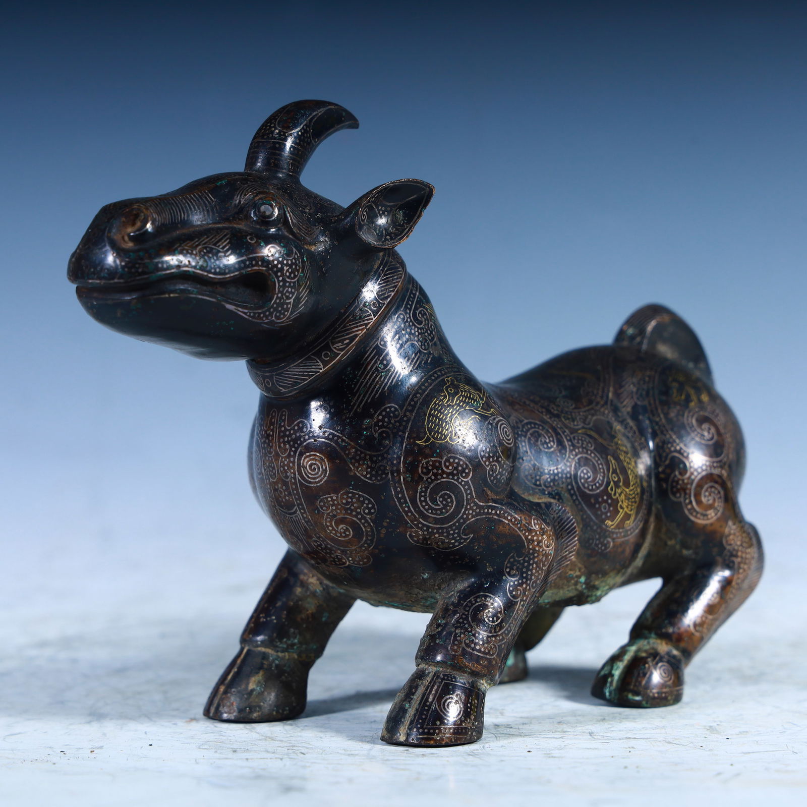 A piece of Western Han wrong gold, silver and copper sheep (1 of 9)