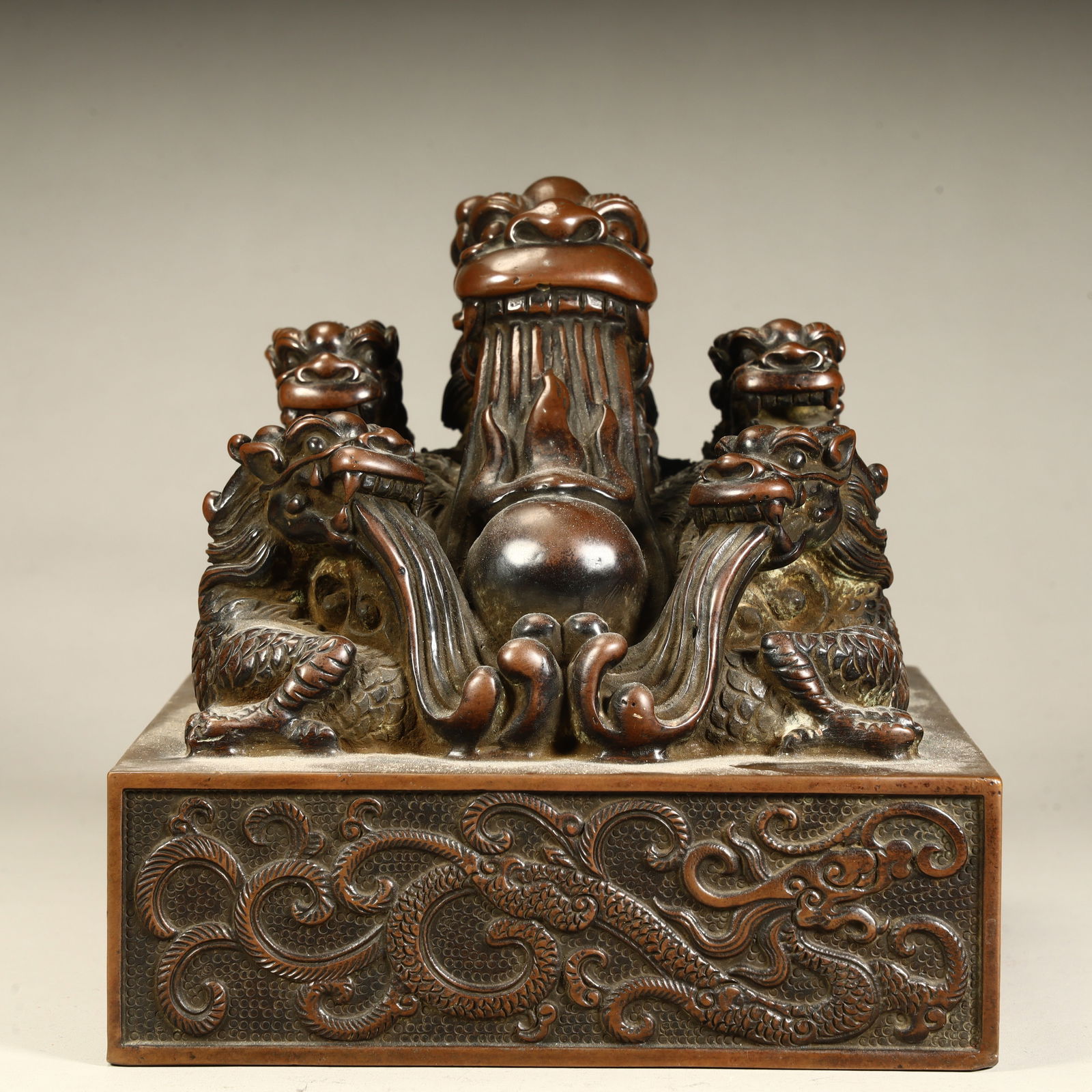 A Qing Dynasty copper multi-dragon button seal (1 of 10)