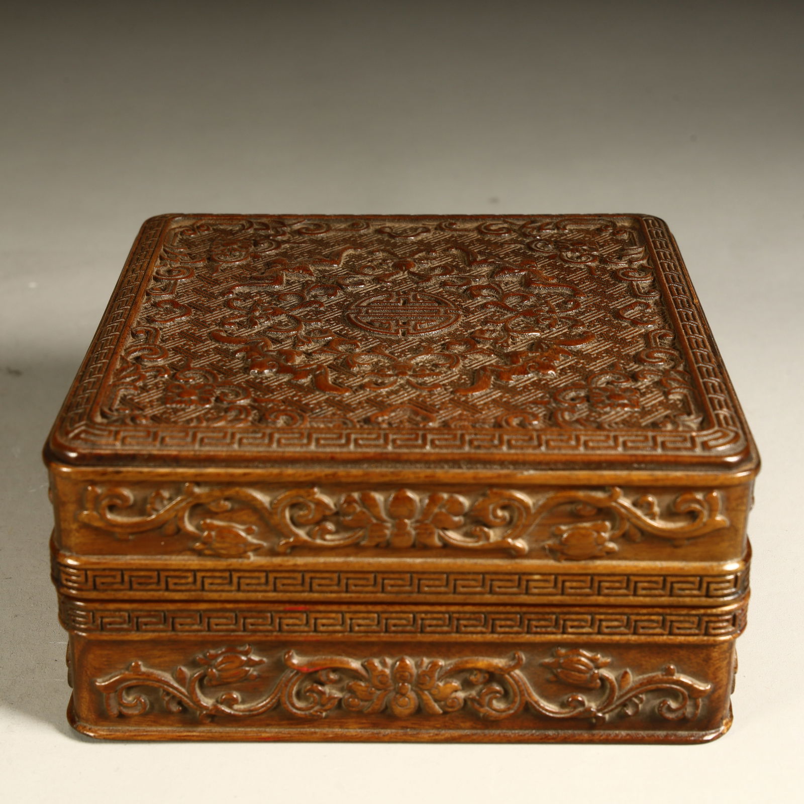 A Qing Dynasty rosewood longevity pattern lid box (1 of 9)
