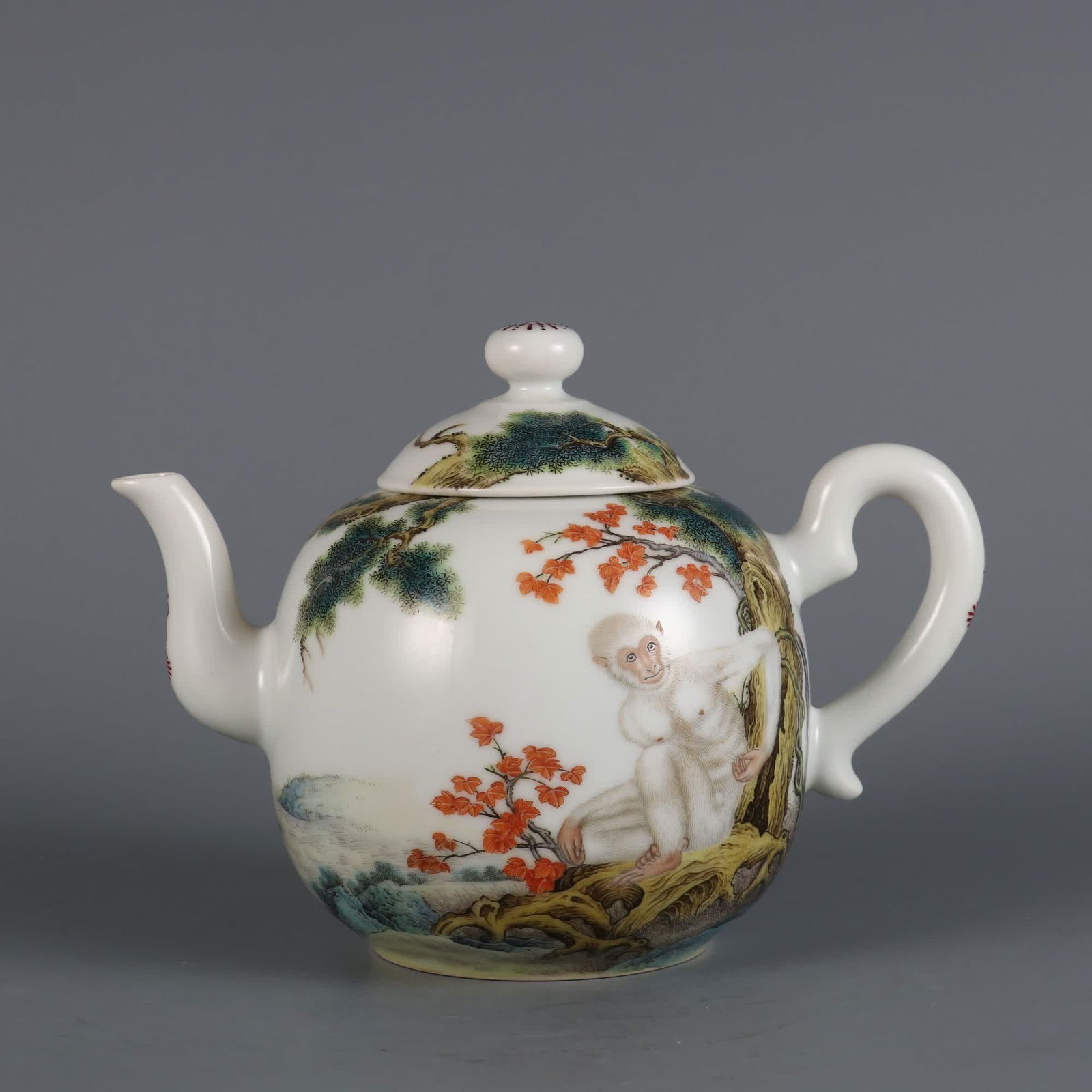 A teapot made in the Qianlong period of the Qing Dynasty with enamel white ape inscriptions (1 of 9)