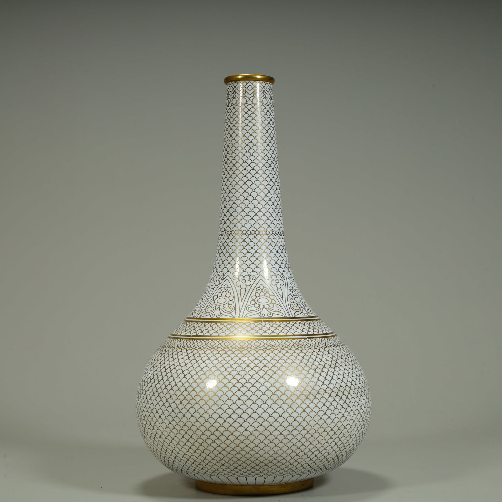 A long-necked vase with gold gold on a white background (1 of 11)