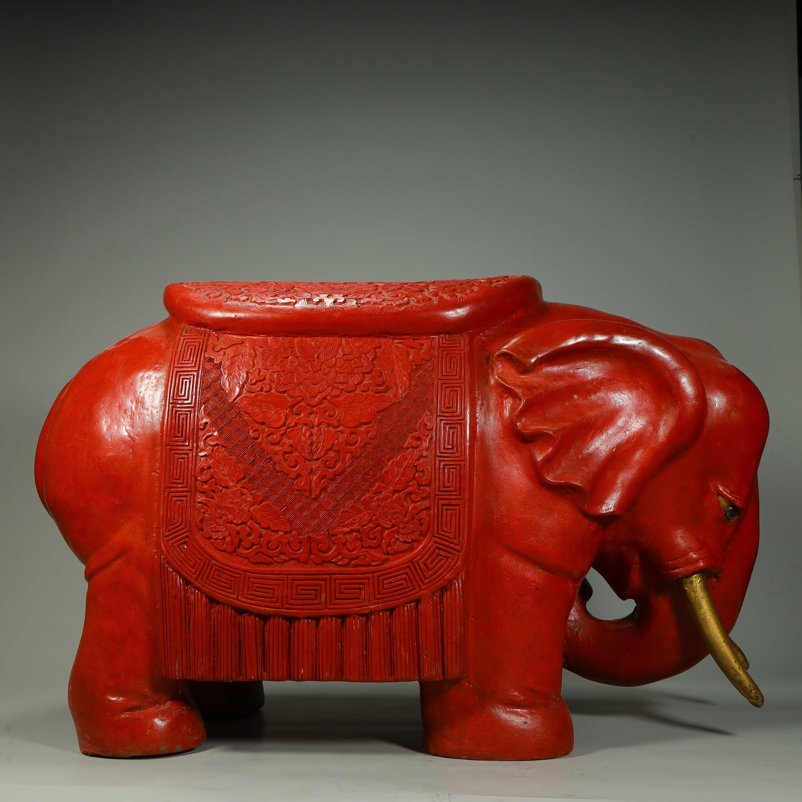 A Qing Dynasty red peaceful ornament: In the Qing Dynasty, there was an elephant ornament in the red peace SIZE: H:45cm L:71cm W:31cm W:25kg (The Dimensions Of All Batches Are Manually Measured.If You Need More Detailed Information,
