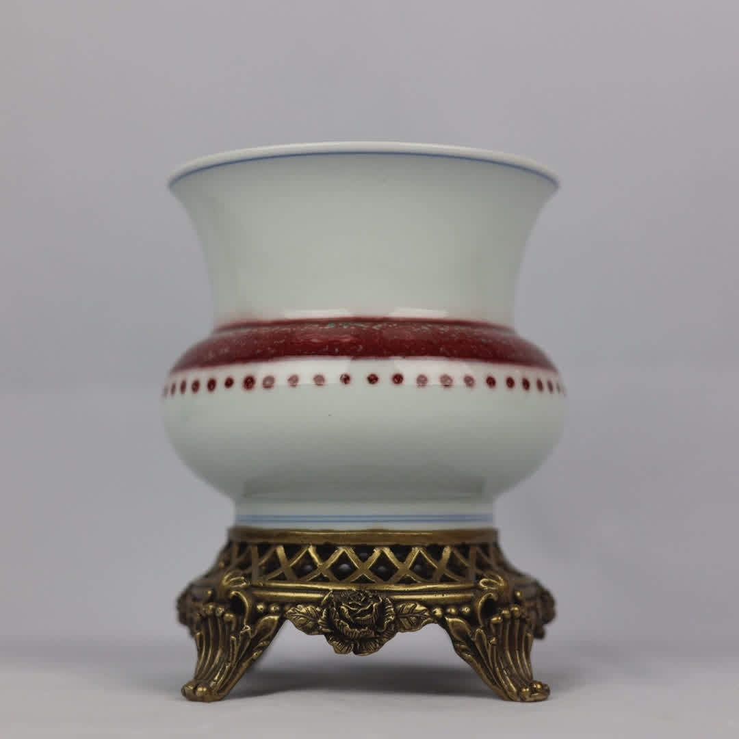 A copper-inlaid porcelain "Lang kiln red glaze string pattern" slag bucket (1 of 9)