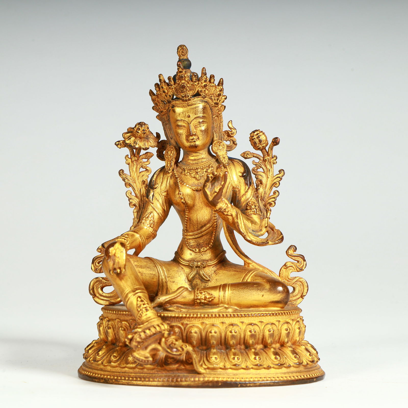A seated statue of Tara in copper gilt in the Qing Dynasty (1 of 9)