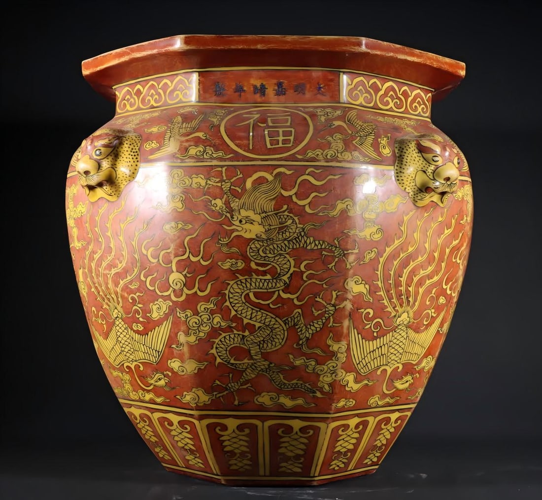 A Ming Dynasty Jiajing yellow red dragon and phoenix pattern animal head octagonal jar: Ming Dynasty Jiajing yellow red dragon and phoenix pattern animal head octagonal jar SIZE: H:40cm W:37cm