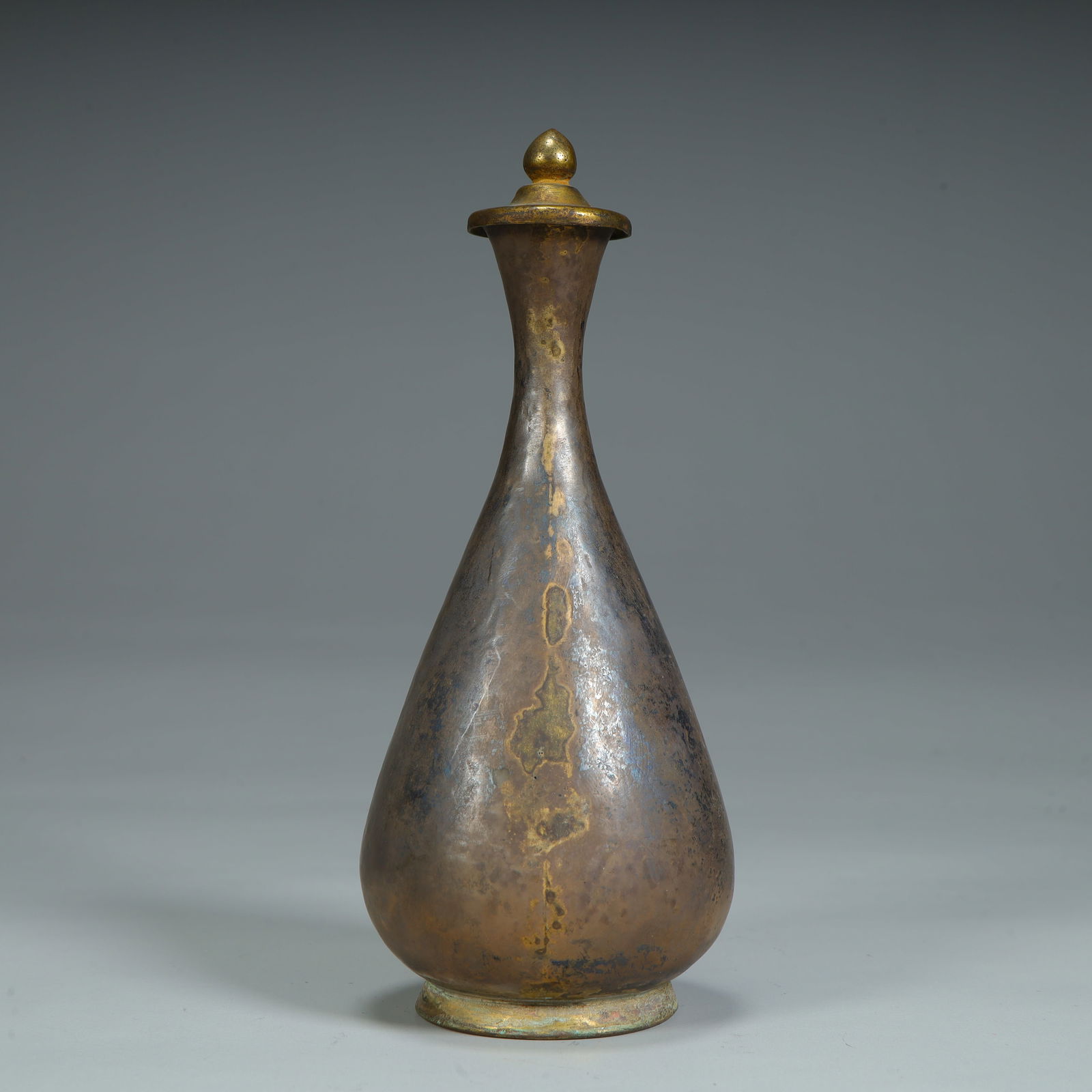 A Qing Dynasty silver tired partially gilt long neck bottle (1 of 9)