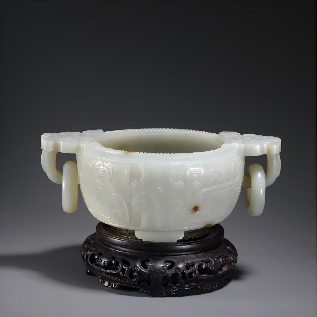 A Qing Dynasty Hetian jade beast face pattern living ring ear furnace (1 of 9)