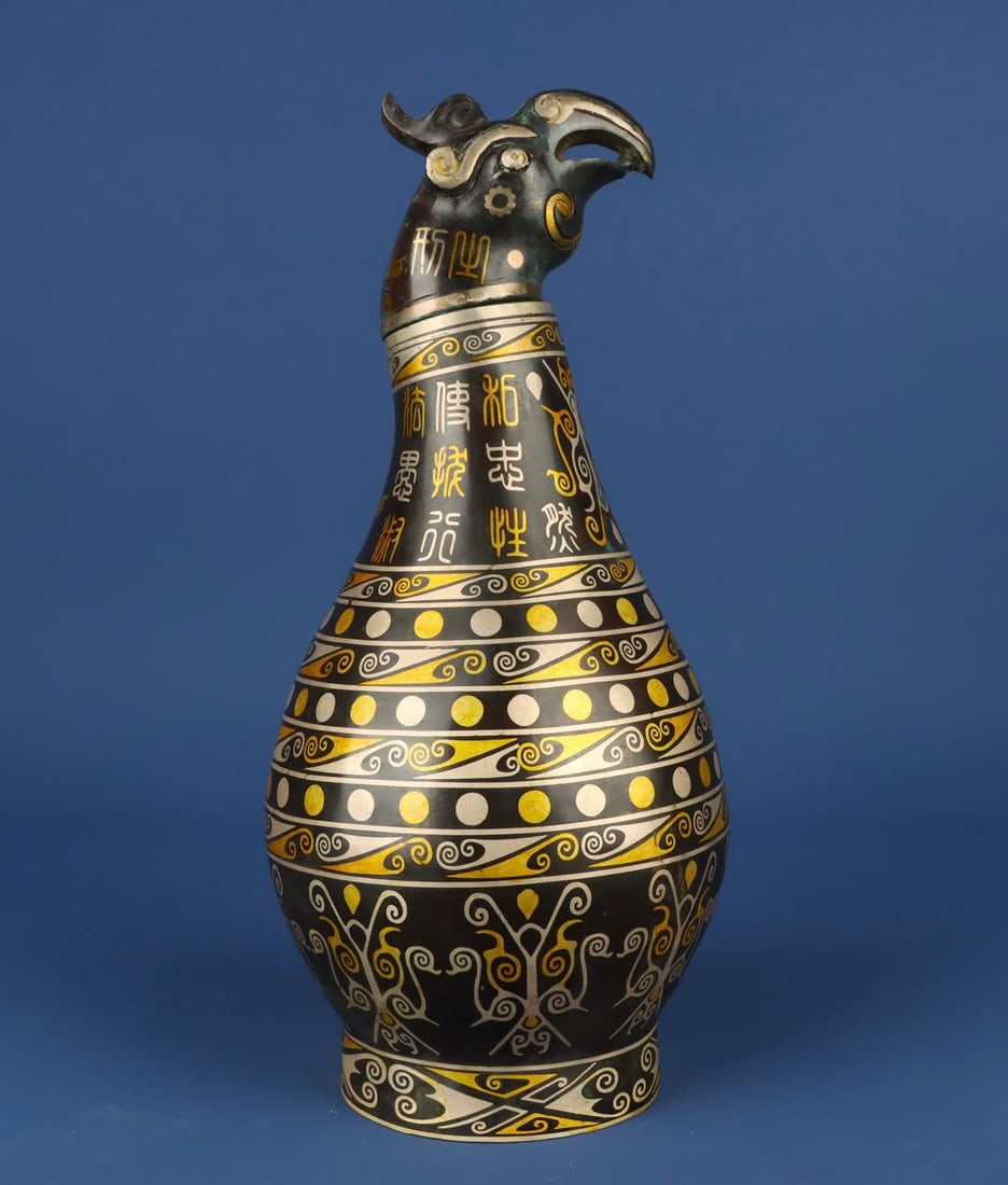 A Han Dynasty_Bronze Cuo gold and silver phoenix head vase (1 of 9)
