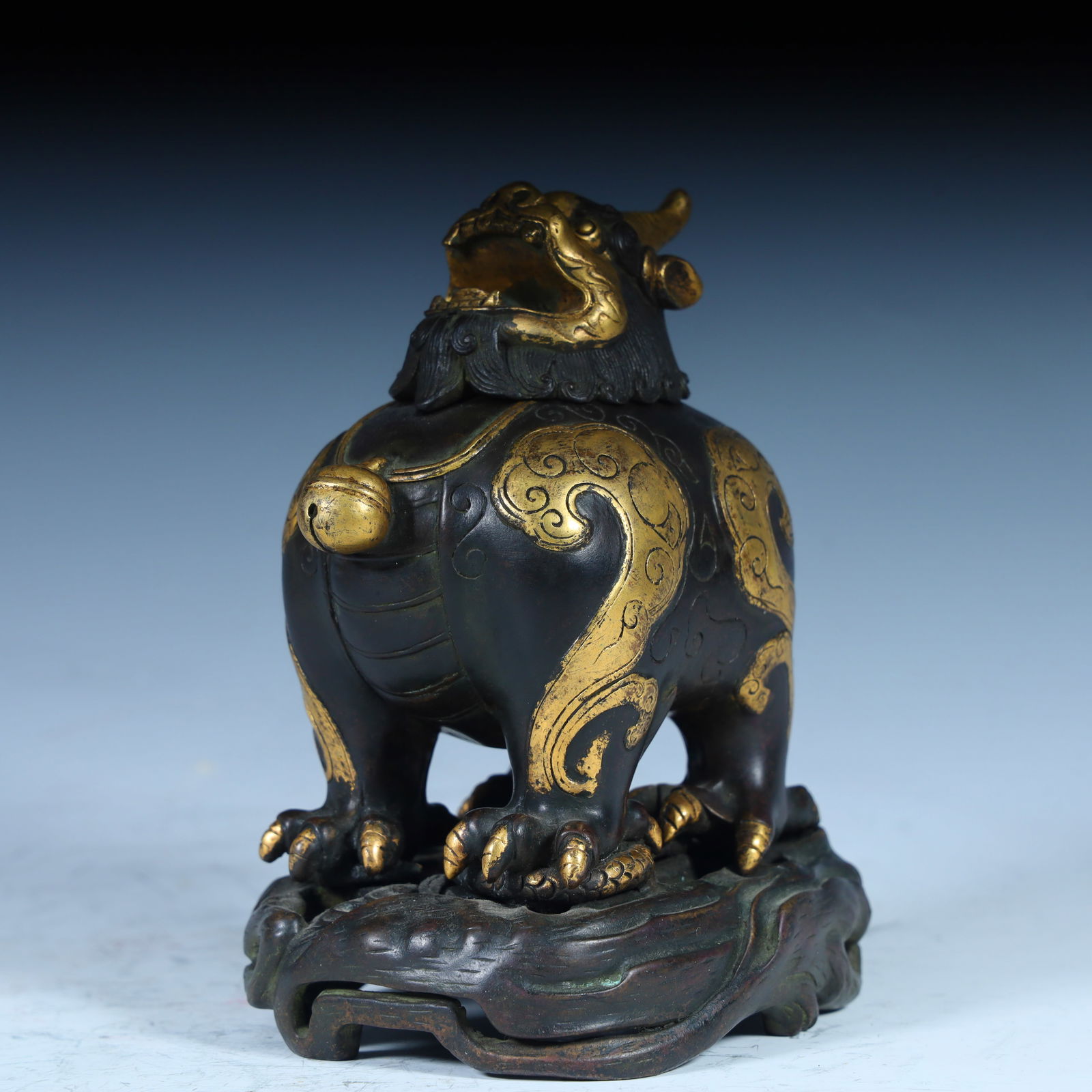 A Qing Dynasty copper gilt beast incense burner (1 of 10)