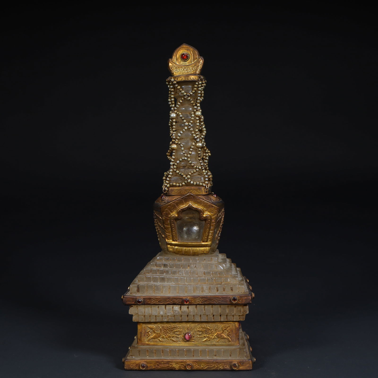 A Tang Dynasty crystal-clad gold-inlaid pearl pagoda: Tang Dynasty crystal-clad gold-inlaid pearl pagoda SIZE: H:27cm L:10.5cm W:10.5cm W:2.2kg