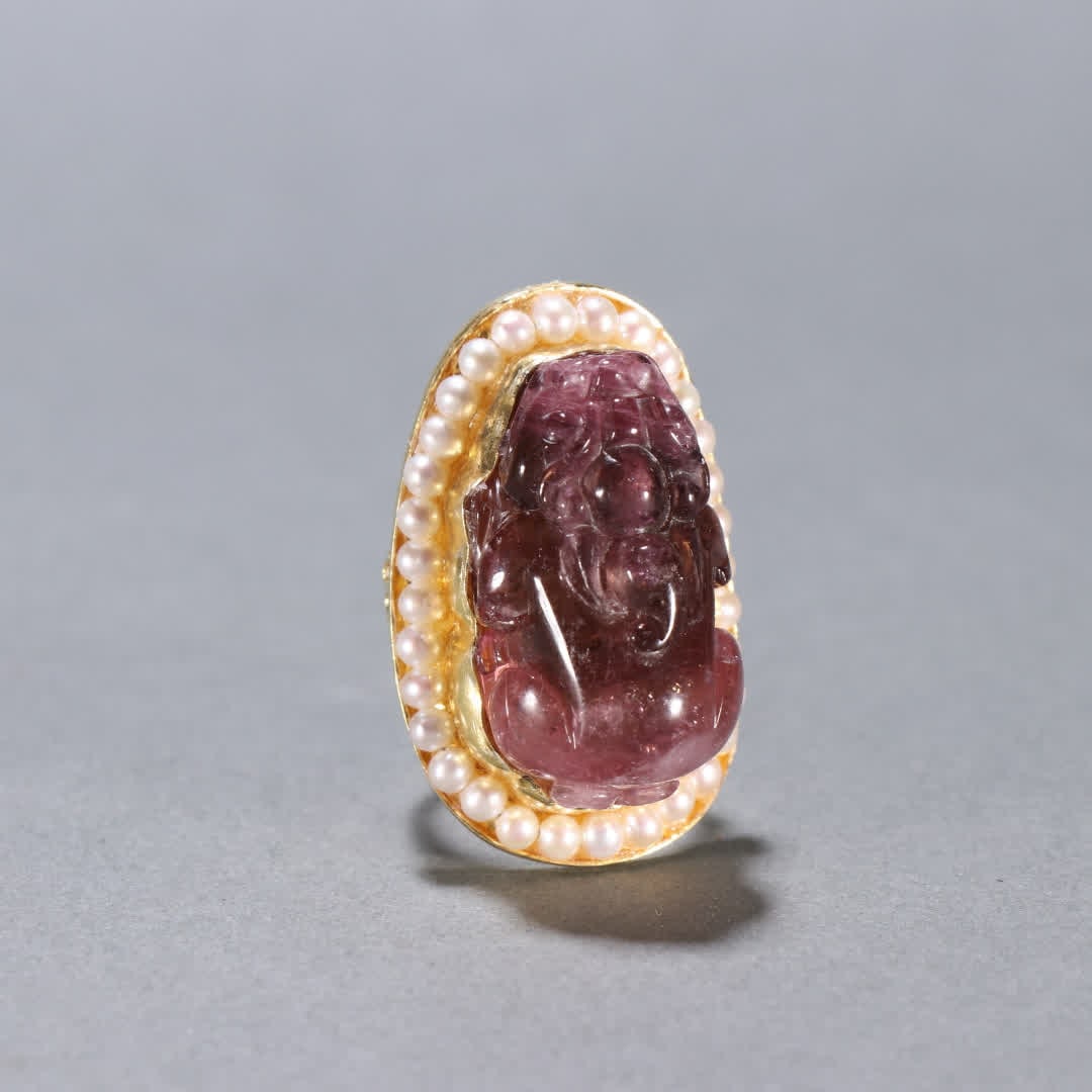 A Qing Dynasty silver-gilt pearl-inlaid tourmaline Pixiu ring (1 of 9)