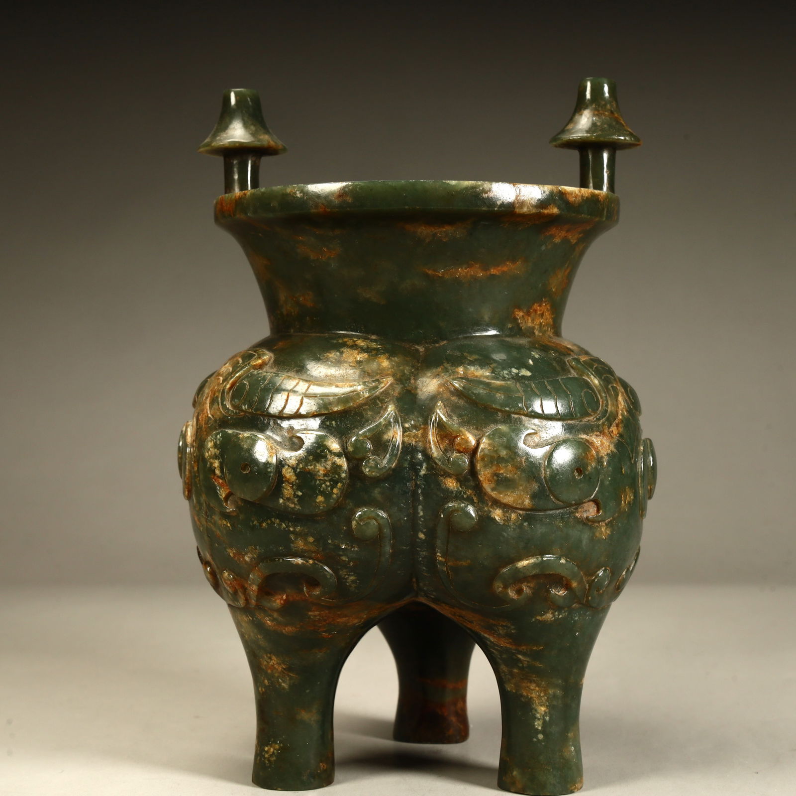 A three-legged cauldron incense burner with an imitation of ancient jade beast face pattern (1 of 11)