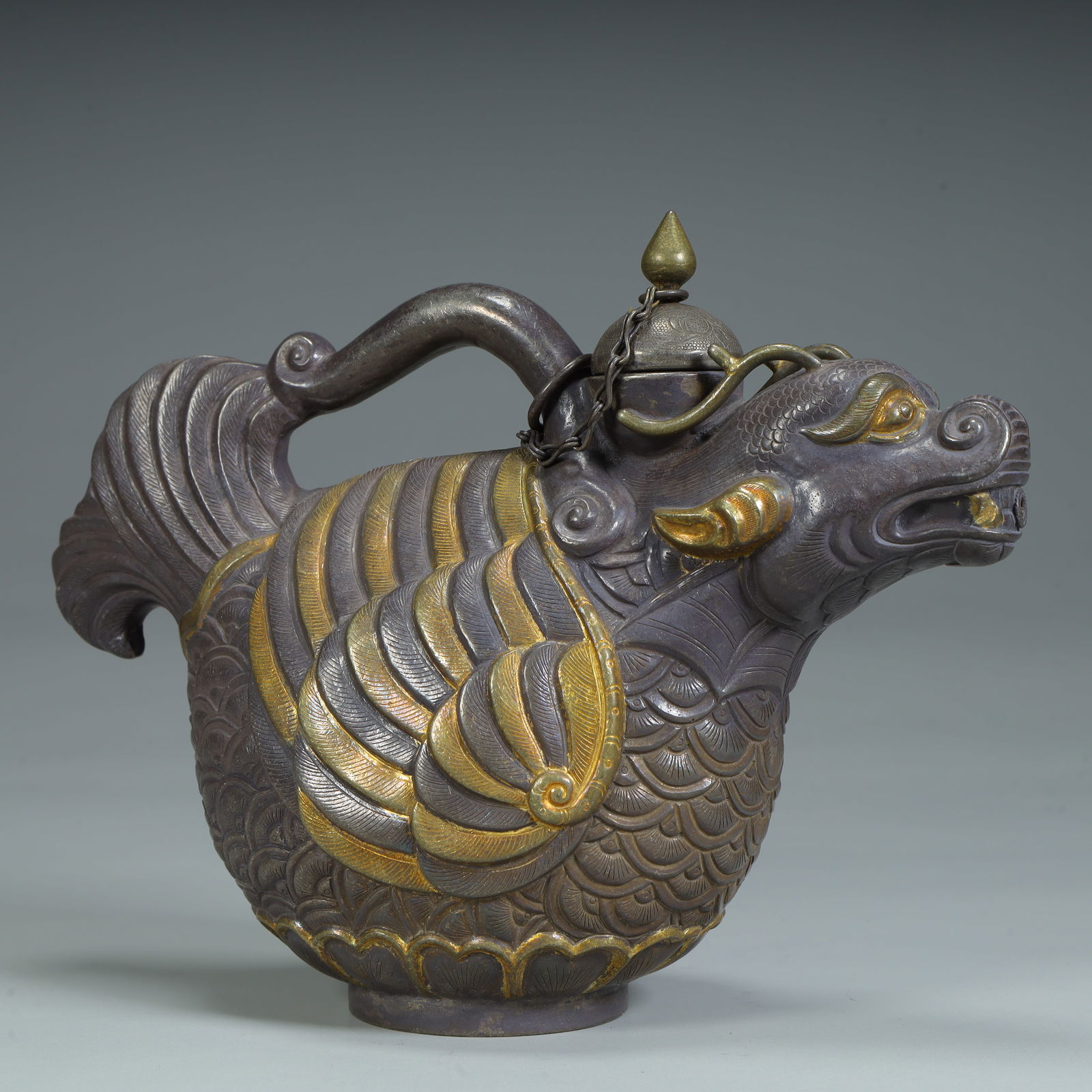 A Qing Dynasty silver-gilt beast-shaped pot (1 of 9)