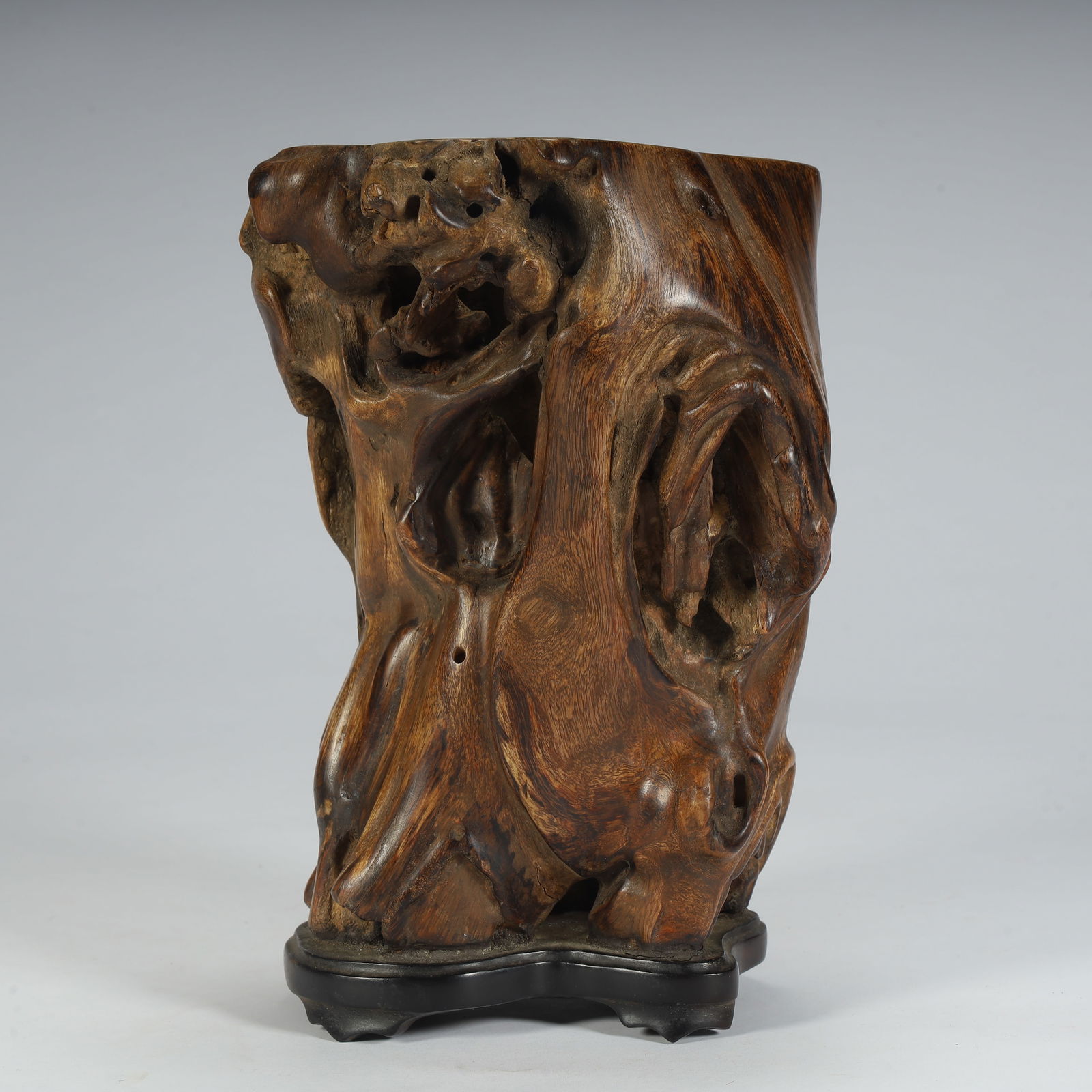 A Qing Dynasty agarwood carved nodule pen bucket (1 of 10)