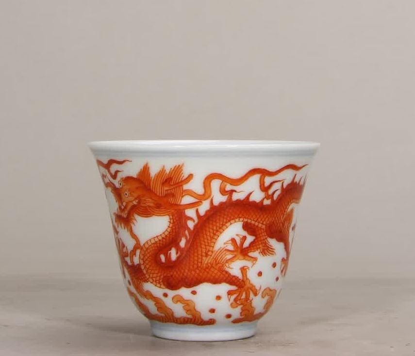 A Qing Dynasty Daoguang alum red sea dragon pattern bell cup: Qing Dynasty Daoguang alum red seawater dragon pattern bell cup SIZE: H:4.9cm mouthD:6.1cm