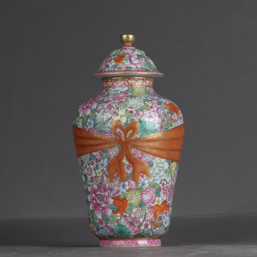 A Qing Qianlong enamel colored gold background kaleidoscope streamer lid jar (1 of 9)