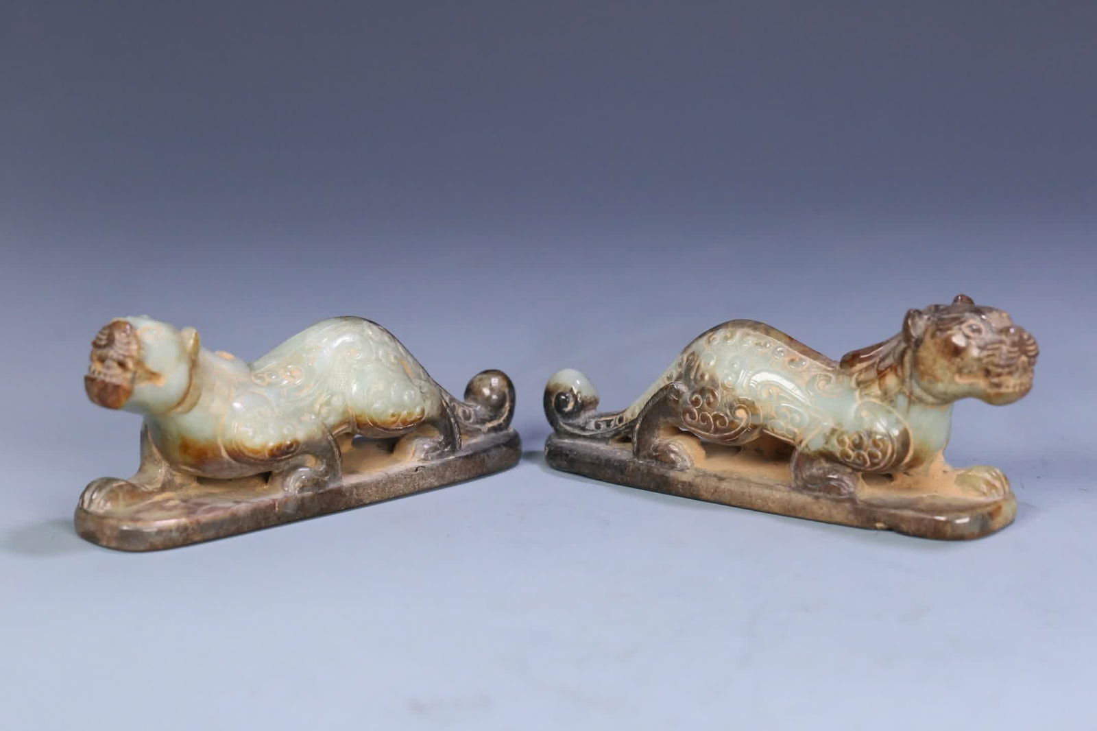 A pair of ancient jade tiger ornaments: A pair of ancient jade tiger ornaments SIZE: 11.6x2.6x4.5cm W:271.2g