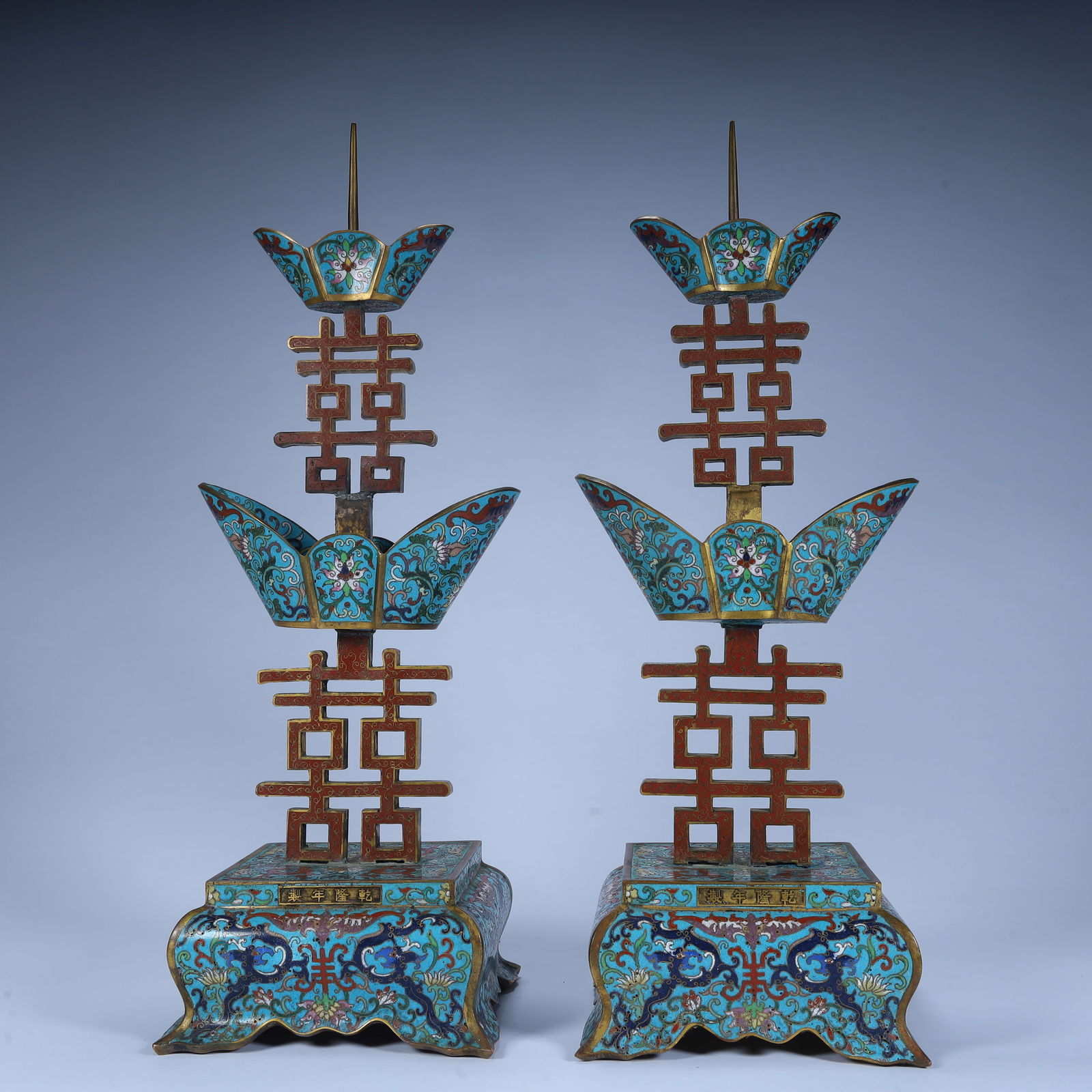 A pair of Qing Dynasty copper tire cloisonné enamel "??" character candlesticks. (1 of 14)