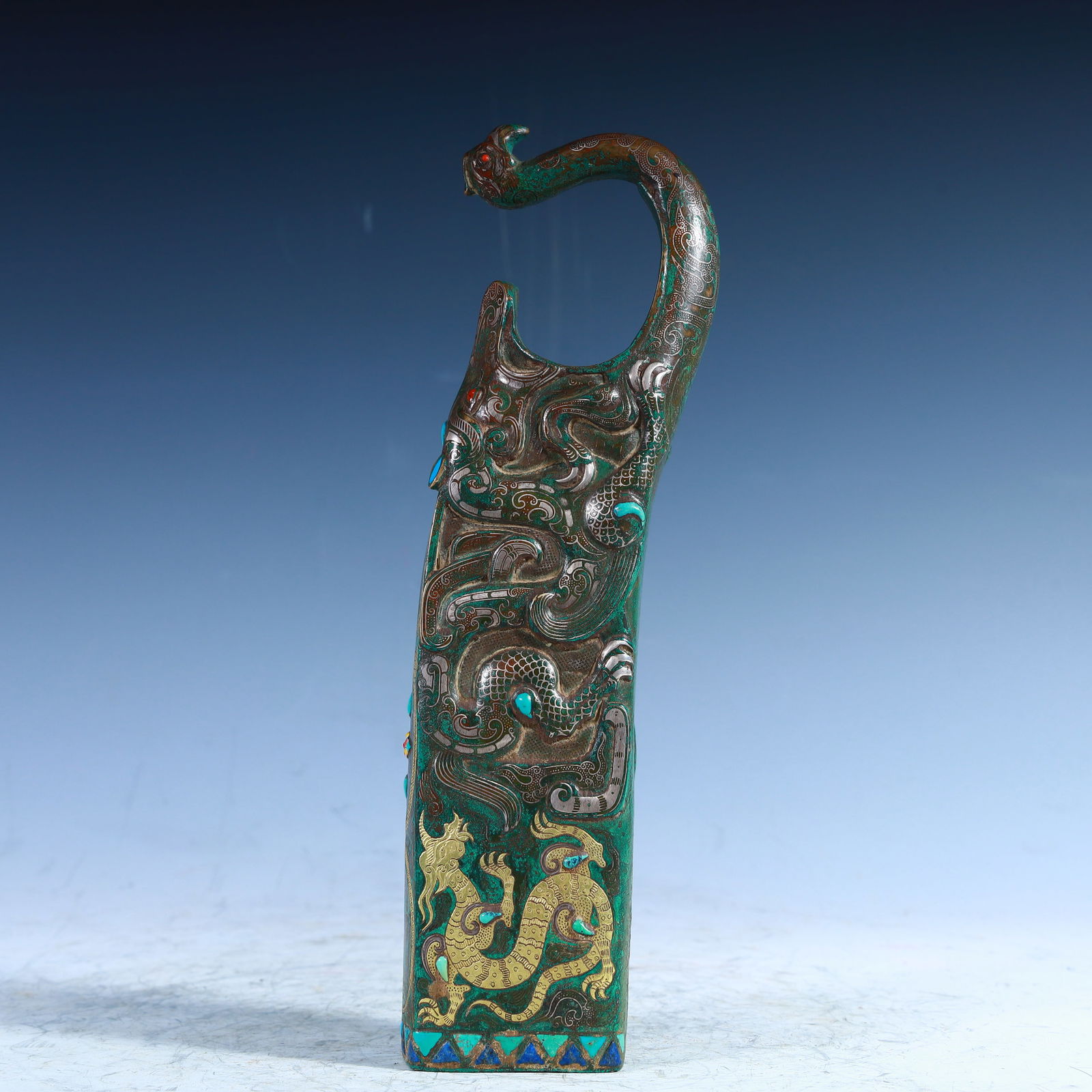 A piece of bronze belt hook with gold and silver inlaid in the Warring States period (1 of 9)
