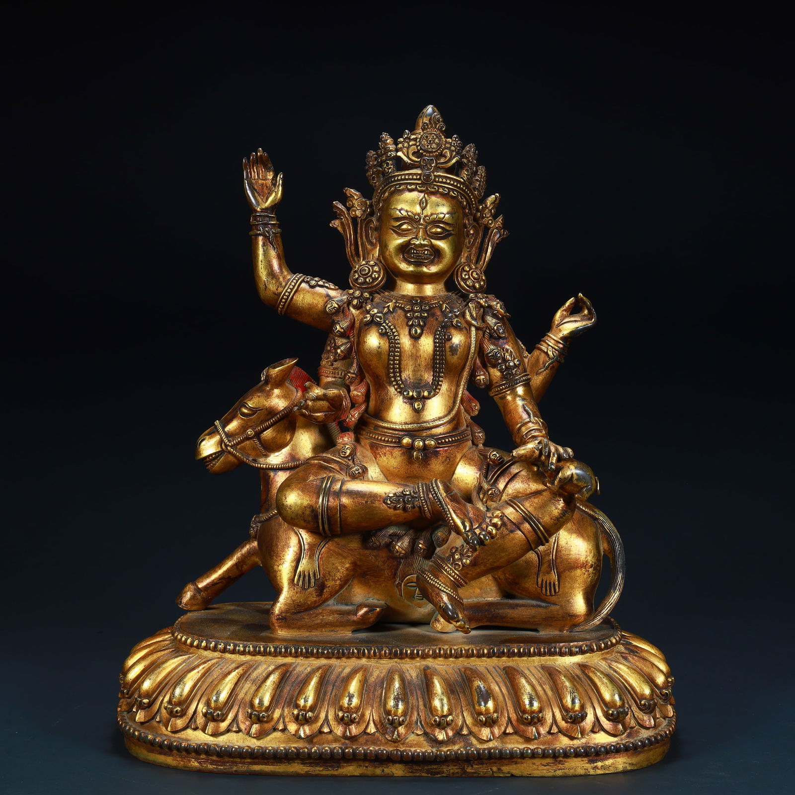 A statue of a Qing Dynasty bronze gilt six-armed donkey protector (1 of 13)