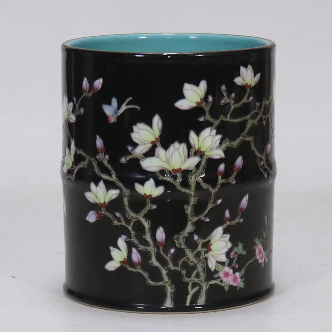A bamboo pen holder made in the Qianlong period of the Qing Dynasty: Qing Qianlong year ink ground glaze flower pattern bamboo pen holder SIZE: H:13 9cm mouthD:11.8cm