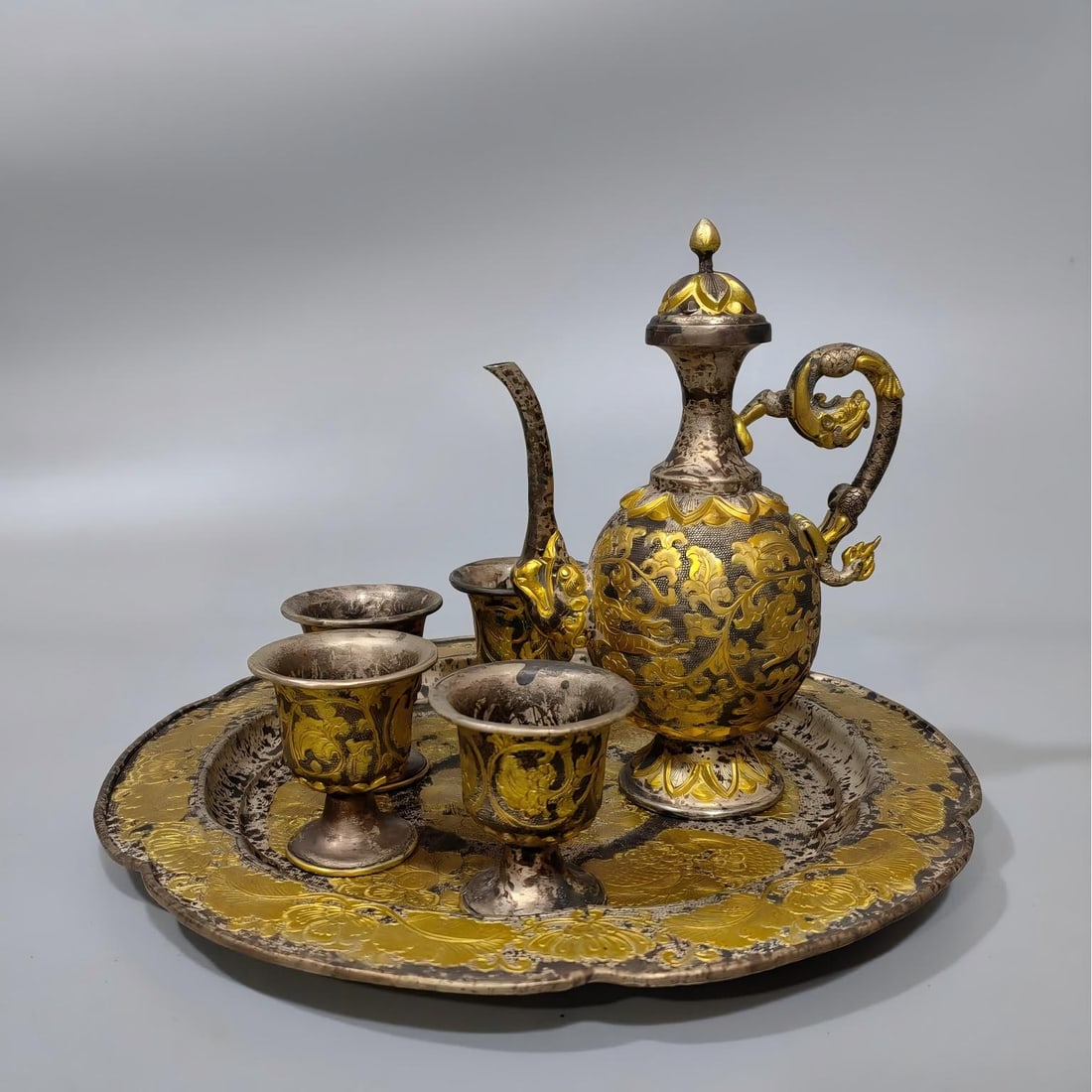 A six-piece set of Tang Dynasty partial gilt wine pots: Tang Dynasty local gilt wine pot six-piece set SIZE: W:1076g L:26cm W:26cm H:18cm
