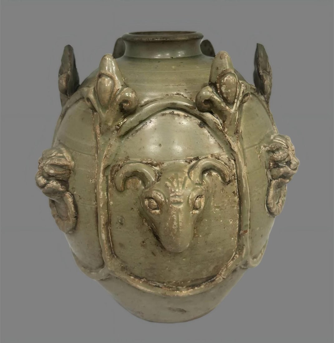 A Yue kiln sheep tiger pattern jar: Yue kiln sheep tiger pattern jar SIZE: H:13cm W:18cm