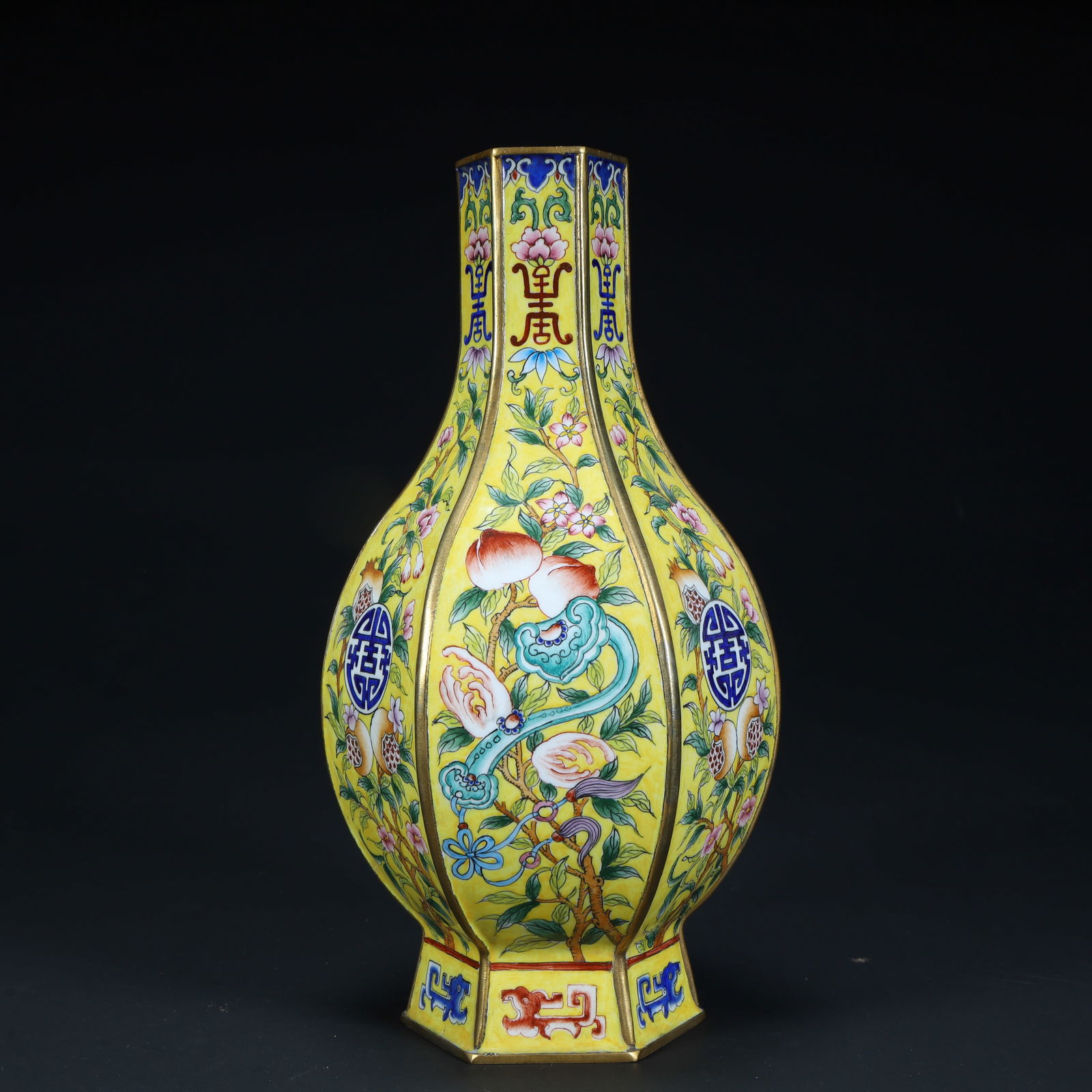 A hexagonal vase with a bronze tire painting enamel yellow ground Fushou pattern from the Qianlong (1 of 10)
