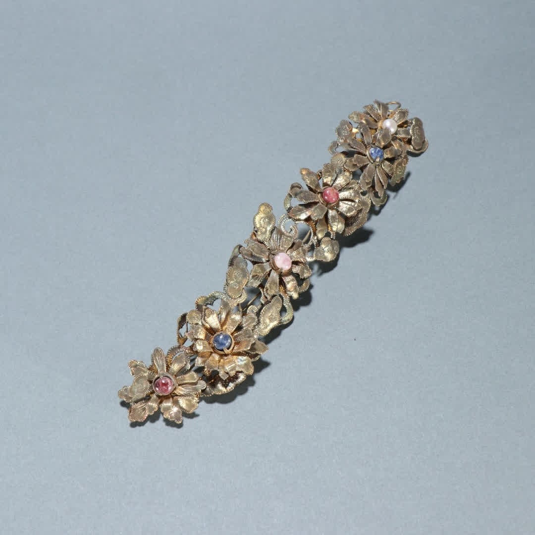 A Qing Dynasty silver-gilt inlaid hundred treasure pattern hair ornaments (1 of 9)