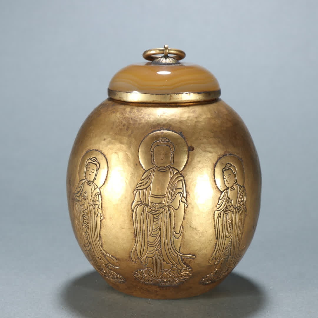 A Liao Dynasty copper-gilt inlaid agate Buddha pattern jar: Liao Dynasty copper gilt inlaid agate Buddha pattern jar SIZE: H:13cm W:9.3cm W:314.4g