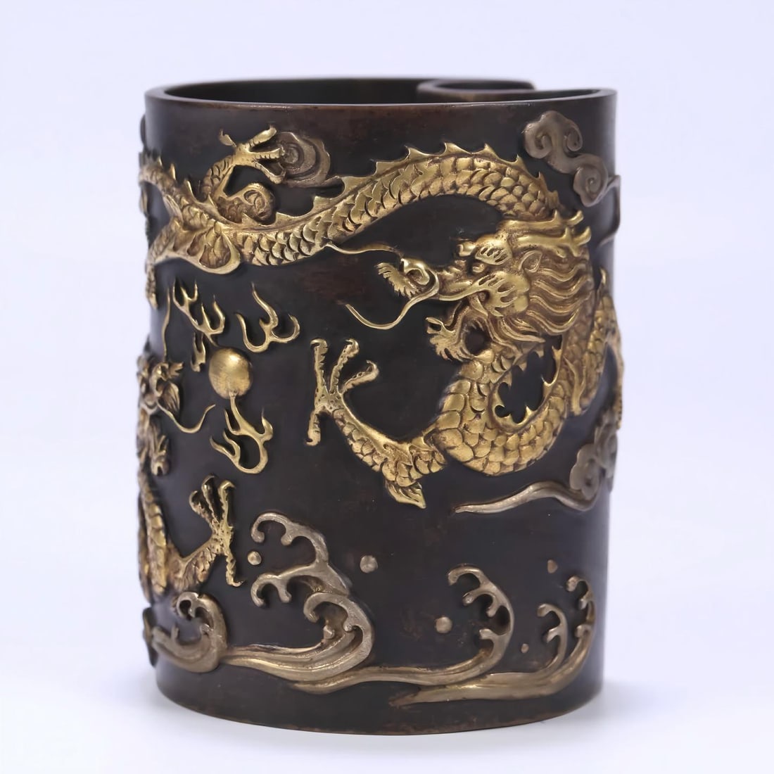 A copper-gilt double dragon playing bead moon-shaped pen holder (1 of 9)