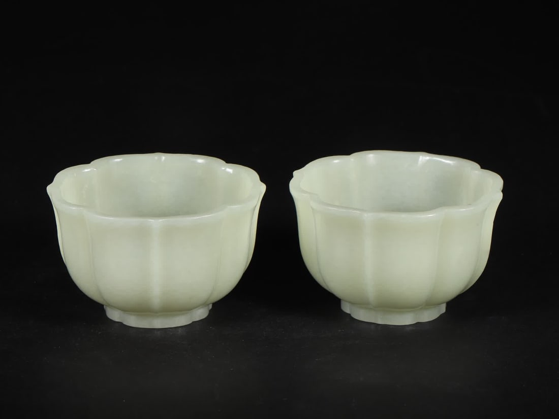 A pair of Qing Dynasty Hetian jade flower edge cups (1 of 9)