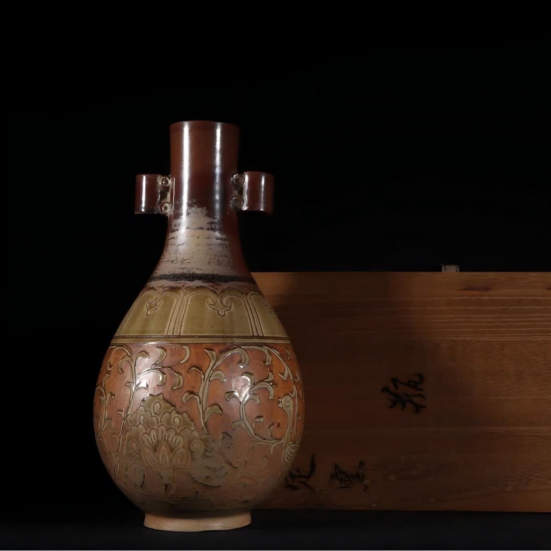 A Song Dynasty Ding kiln purple gold glaze carved through the ear: Song Dynasty Ding kiln purple gold glaze carved through the ears SIZE: H:30cm W:16cm (The Dimensions Of All Batches Are Manually Measured.If You Need More Detailed Information, Please Contact Our