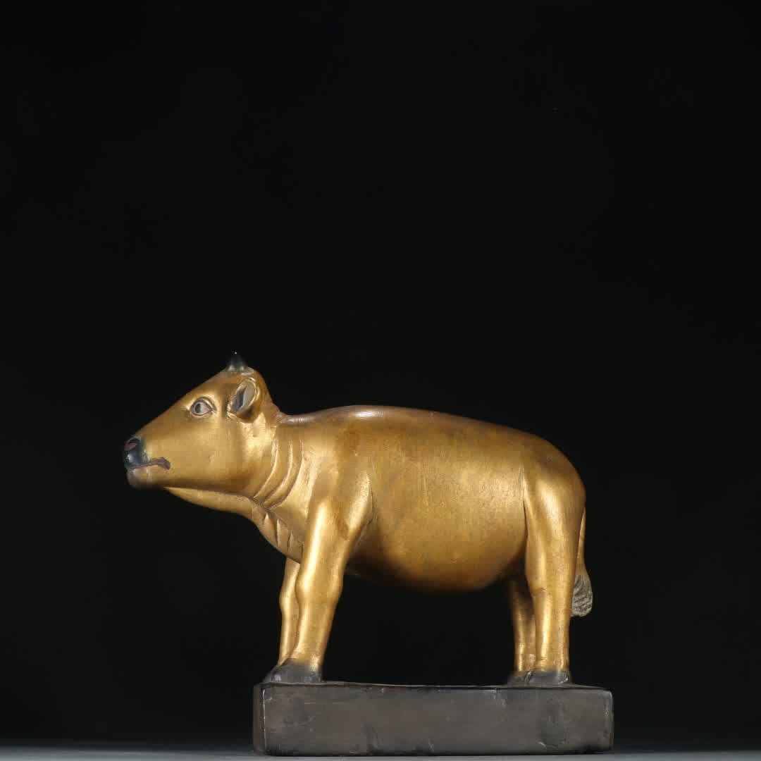 A Qing Dynasty copper gilt bull ornament (1 of 9)
