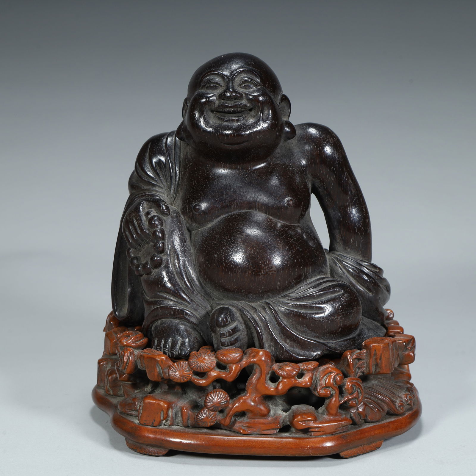 A seated statue of Maitreya Buddha carved in rosewood from the Qing Dynasty (with a boxwood base) (1 of 9)