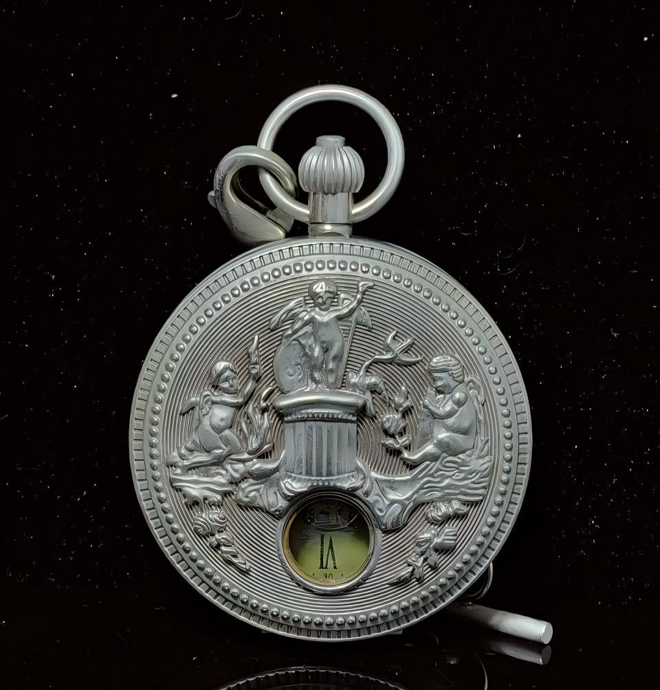 A double-open pocket watch of the sun, moon and stars (1 of 6)