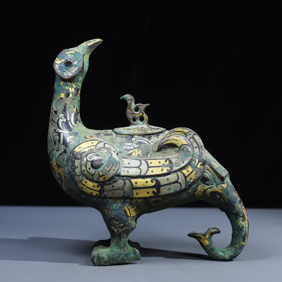 A Han Dynasty copper cuo gold and silver return bird statue (1 of 10)
