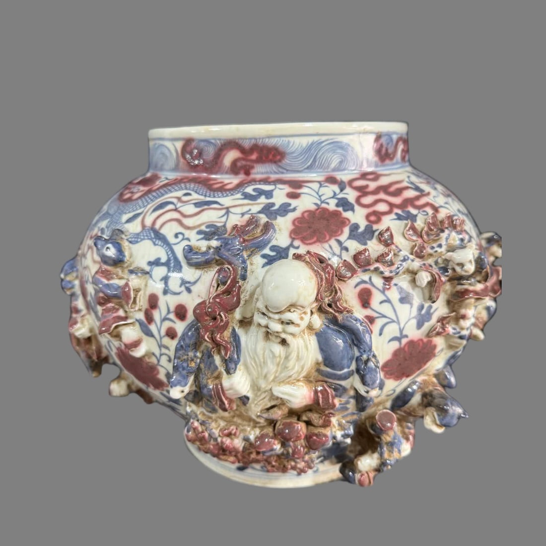 A glazed red pile carved figure pot: The red pile in the glaze carved figure picture jar SIZE: H:30cm W:38cm (The Dimensions Of All Batches Are Manually Measured.If You Need More Detailed Information, Please Contact Our Customer Service