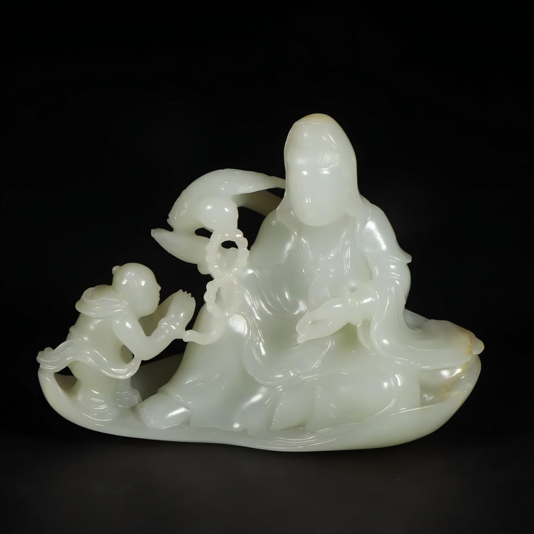 A Qing Dynasty Hetian jade boy worshiping Guanyin ornament (1 of 9)