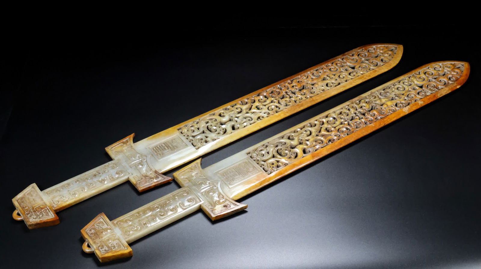 A pair of Han Dynasty jade hollow overall jade swords (1 of 9)