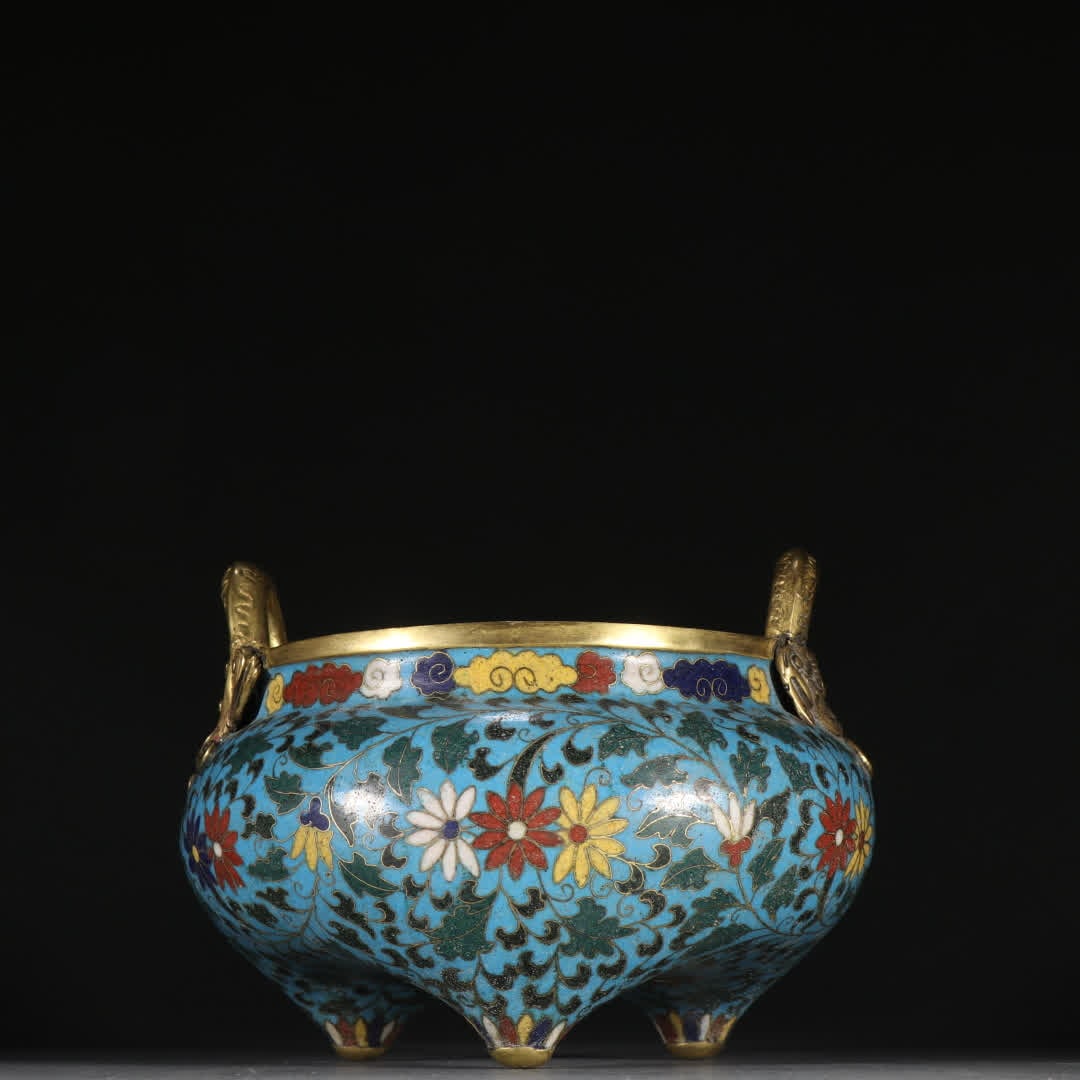 A Qing Dynasty Ming copper gilt cloisonné entwined three-legged incense burner: Qing Dynasty Ming Dynasty copper gilt cloisonné entwined pattern three-legged incense burner SIZE: H:11.6cm W:15.6cm W:960g (The Dimensions Of All Batches Are Manually Measured.If You Need More