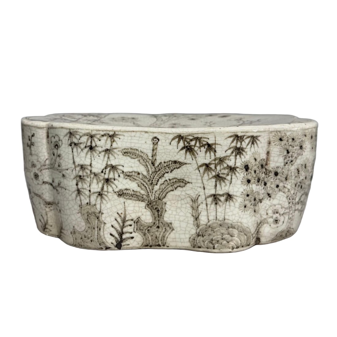 A Ming Dynasty Cizhou kiln ink color bamboo stone banana leaf pattern porcelain pillow: Ming Dynasty Cizhou kiln ink color bamboo stone banana leaf pattern porcelain pillow SIZE: H:13cm L:35cm (The Dimensions Of All Batches Are Manually Measured.If You Need More Detailed Information, Ple