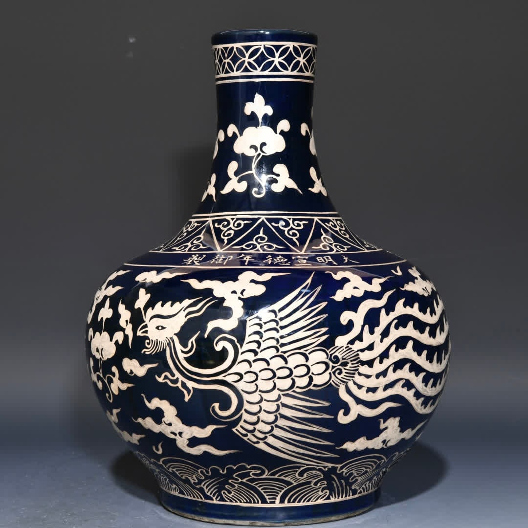 A Ming Xuande Festival blue painted silver phoenix pattern heavenly ball vase: Ming Xuande Festival blue painted silver phoenix pattern heavenly ball vase SIZE: H:28.5cm D:21.5cm (The Dimensions Of All Batches Are Manually Measured.If You Need More Detailed Information, Please C