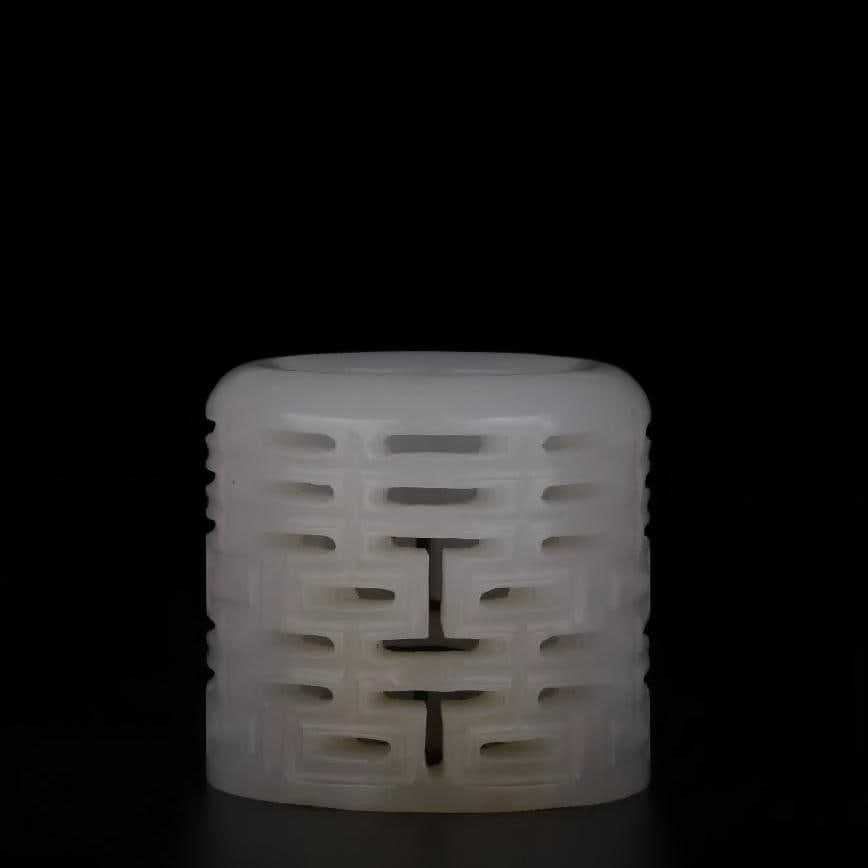 A piece of Qing Dynasty Hetian white jade carved double happiness finger: Qing Dynasty Hetian white jade carved double happiness finger SIZE: H: 3.3cm D: 3.4cm inner diameter 2.1cm W: 38g (The Dimensions Of All Batches Are Manually Measured.If You Need More Detailed