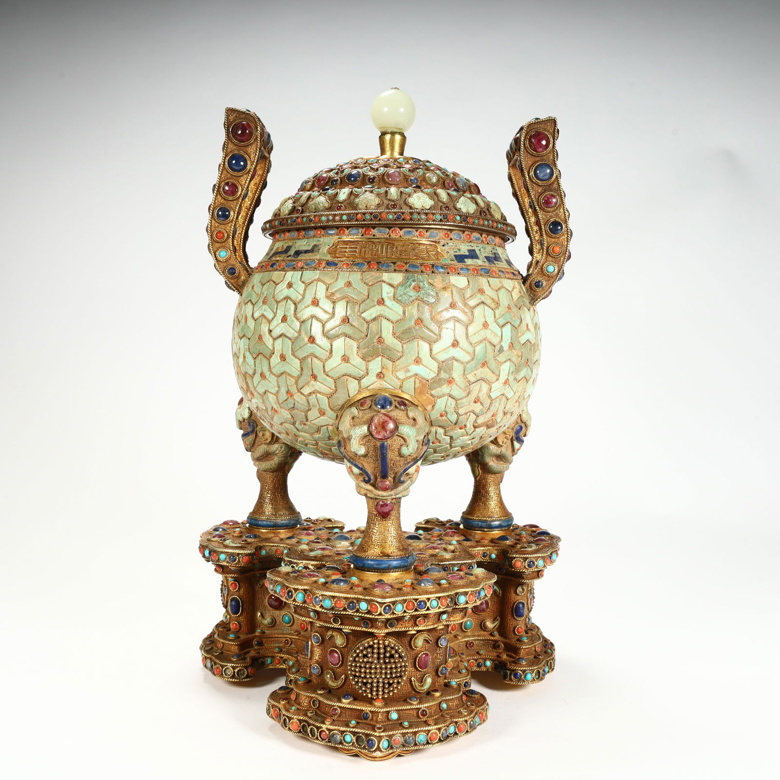 A gold tyre inlaid gemstone aromatherapy stove: Gold tire inlaid with turquoise aromatherapy stove SIZE: H:28cm L:18cm W:18cm W:5.1kg (The Dimensions Of All Batches Are Manually Measured.If You Need More Detailed Information, Please Contact Our