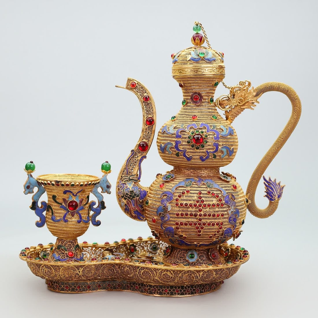 A Qing Dynasty cloisonné treasure inlaid Fushou wine set: Qing Dynasty cloisonncloisonné treasure inlaid Fushou wine set SIZE: H: 29.5cm L: 26cm W: 25.5cm Overall W: 1080g (The Dimensions Of All Batches Are Manually Measured.If You Need More Detailed