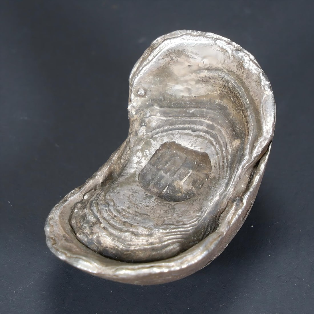 A silver ingots with the character "Lu" in the Qing Dynasty (1 of 6)