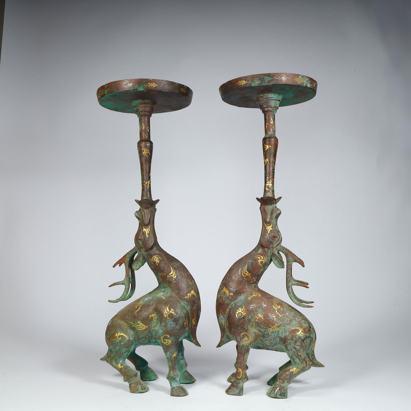 A pair of gold, silver, bronze and deer lamps from the Warring States period to the Han Dynasty (1 of 15)